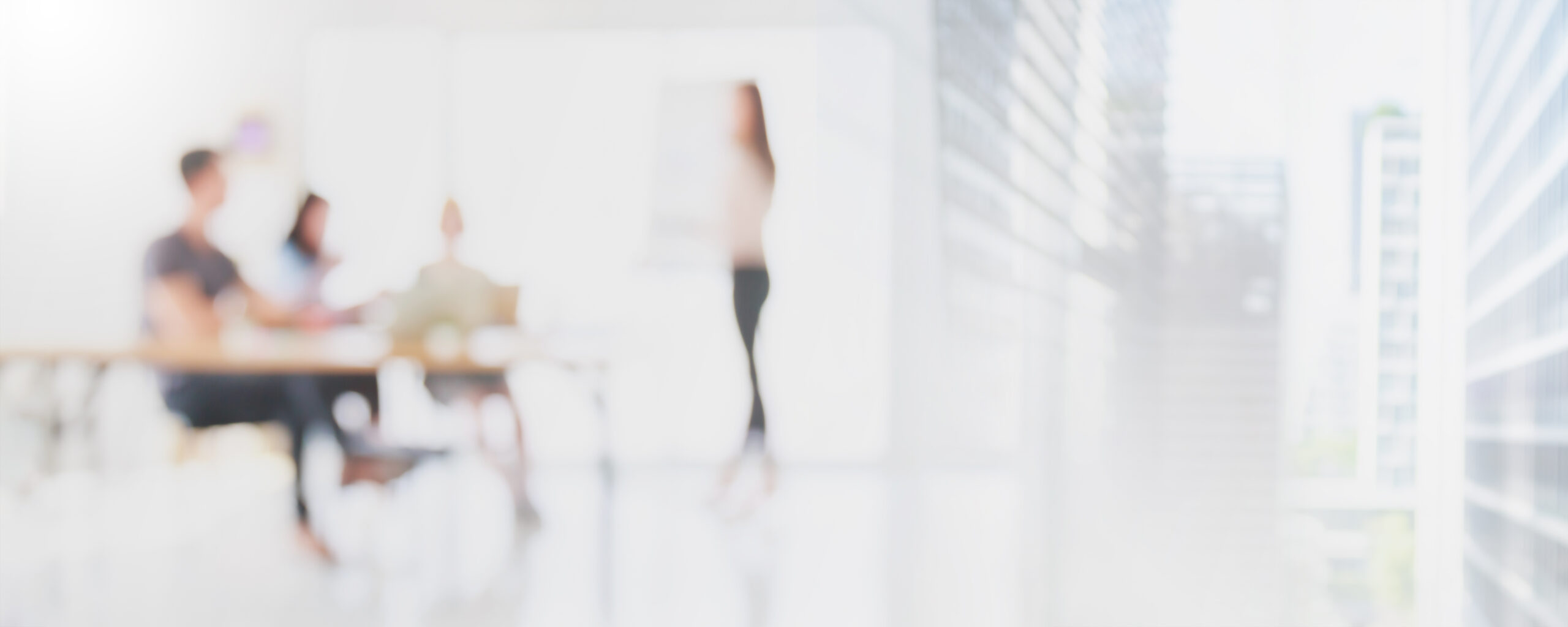 Abstract blurred interior modern office space with business people working banner background with copy space.